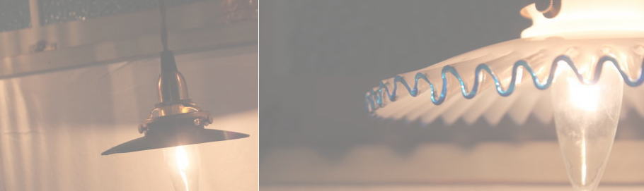 ミルクガラスとアイアン素材のペンダント照明が並ぶインテリア空間のイメージ写真