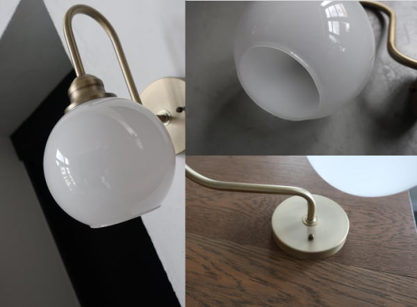 ミルク色のラウンドガラスと真鍮風ブラケットのライト